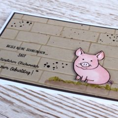 Geprägte Männerkarte mit einem Glücksschweinchen